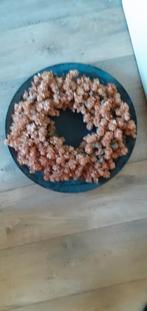 Groote hop krans, Ophalen