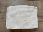 Nieuw Clarins toilettas beige met goud. toilettasje, Ophalen of Verzenden, Zo goed als nieuw, Beige, Dame