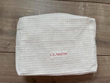 Nieuw Clarins toilettas beige met goud. toilettasje beschikbaar voor biedingen