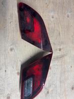 Opel astra J achterlichten, Ophalen