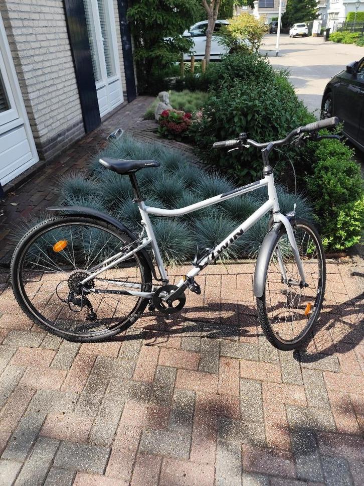 Bijna nieuwe hybride B-Twin Riverside 120, Fietsen en Brommers, Fietsen | Dames | Sportfietsen en Toerfietsen, Zo goed als nieuw