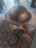 Wereldbol globe bar, Ophalen