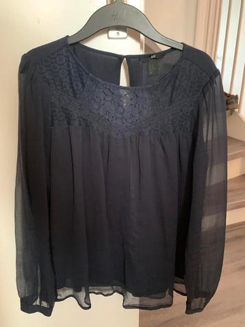 Blauwe blouse maat 40 beschikbaar voor biedingen