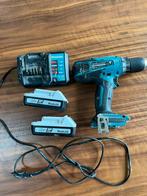 Makita accuboor met oplader en 2 accus, Doe-het-zelf en Verbouw, Gereedschap | Boormachines, Ophalen of Verzenden, Gebruikt, Variabele snelheid