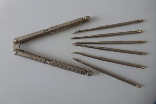 notenkraker met 6 haakjes sierlijk metaal goudkleurig eind, Antiek en Kunst, Antiek | Gereedschap en Instrumenten, Ophalen