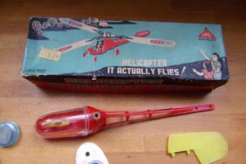 Antieke speelgoed helicopter uit 1950 van PMC beschikbaar voor biedingen