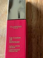 Clarins Instant Light Lip Comfort Oil 04 intense rosewood, Lippen, Nieuw, Ophalen of Verzenden, Make-up