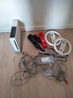 Nintendo Wii met 1 controller en 2 stuurtjes, Ophalen of Verzenden, Gebruikt, Met 1 controller