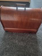 naaimachine, Ophalen