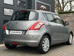 Suzuki Swift CLIMATE CRUISE CONTR / EL DAK / NAVIGATIE ..., Auto's, Voorwielaandrijving, 94 pk, Stof, Gebruikt
