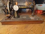 Naumann antieke naaimachine, Ophalen