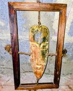 Afrikaans masker in houten frame, Ophalen