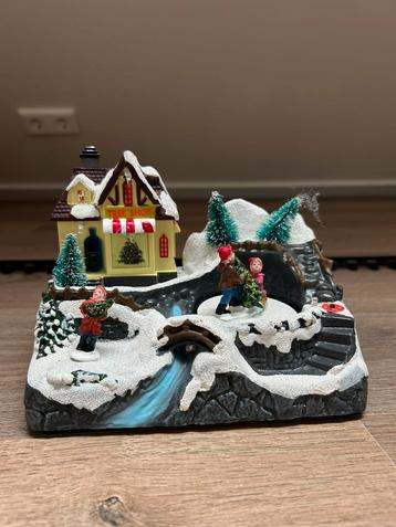 Kersttein met twee huizen beschikbaar voor biedingen