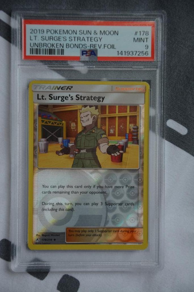 Lt Surge Strategy Trainer Foil Holo Unbroken Bonds PSA 9, Ophalen of Verzenden, Gebruikt, Losse kaart, Foil
