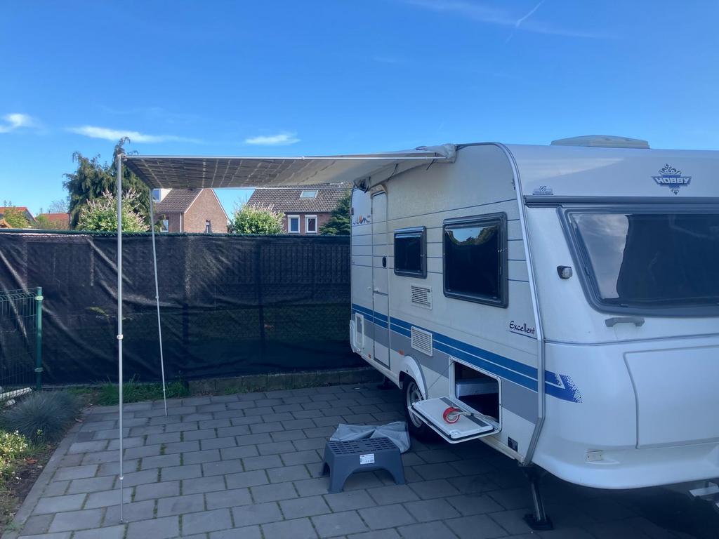 Caravan zakluifel met zijwand, Ophalen