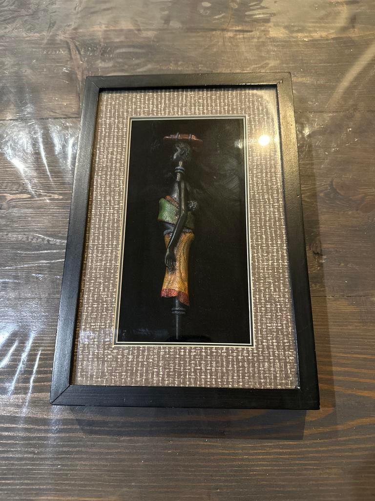 Ingelijst schilderij met Afrikaanse vrouw, Ophalen