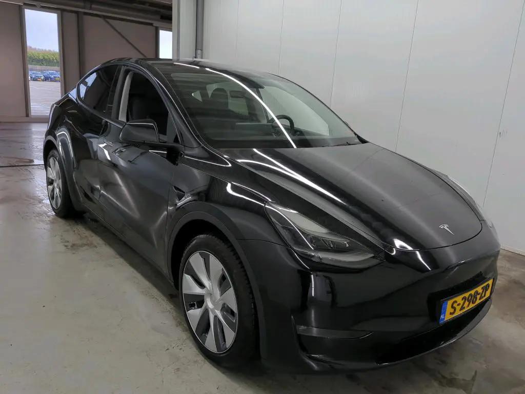 Tesla Model Y Long Range AWD 75 kWh LAGE KM! / € 37.950,00, Auto's, Tesla, Gebruikt, Zwart, 351 pk, 1600 kg