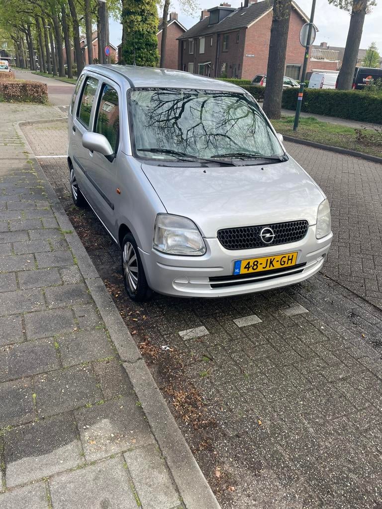 Opel Agila 1.2 I 16V 2002 Grijs, Auto's, Opel, Voorwielaandrijving, 15 km/l, 74 pk, 31 €/maand
