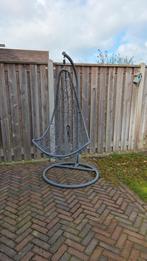 Grijze hangstoel voor buiten, Ophalen