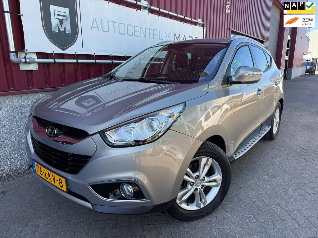 Hyundai Ix35 2.0i Business Edition // Automaat // Navi // Cl, Gebruikt, Zwart, 4 cilinders, Leder en Stof