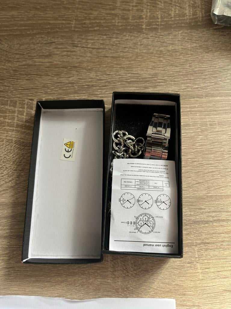 Gloednieuw Geneva horloge - nooit gedragen, Sieraden, Tassen en Uiterlijk, Horloges | Heren, Overige merken, Staal, Polshorloge