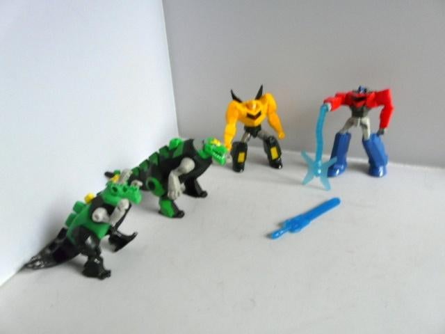 McDonalds 2015 # Transformers en accesoires (4x), Verzamelen, Transformers, G1, Ophalen of Verzenden, Zo goed als nieuw