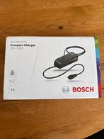 Bosch Compact Charger 100-240V - Nieuw!, Fietsen en Brommers, Fietsaccessoires | Fietsaccu's, Ophalen of Verzenden, Nieuw