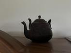 Antieke theepot met portret, Ophalen
