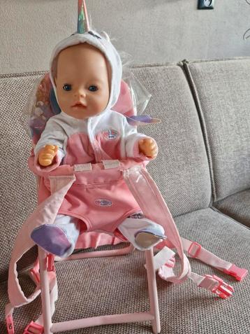 Babyborn met kinderstoel/draagzak beschikbaar voor biedingen