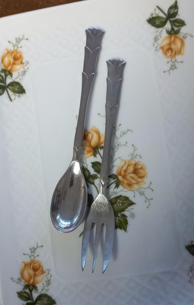 Set van ( thee)lepeltje en ( gebaks)vorkje, Gero, nr. 453, Antiek en Kunst, Curiosa en Brocante, Ophalen of Verzenden