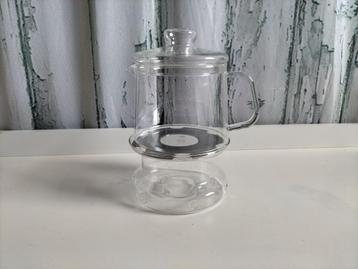 Mooie glazen theepot met theelichtje van Douwe Egberts. beschikbaar voor biedingen
