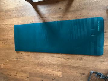 Groene pilates mat Decathlon beschikbaar voor biedingen