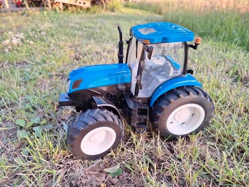 ERTL New Holland tractor + Knerveland ploeg, Kinderen en Baby's, Speelgoed | Speelgoedvoertuigen, Ophalen of Verzenden