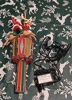 Mr. Christmas tree topper bewegende piek, Ophalen