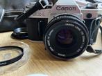 Canon AE-1 met 50mm lens en toebehoren, Audio, Tv en Foto, Fotocamera's Analoog, Ophalen of Verzenden, Refurbished, Spiegelreflex