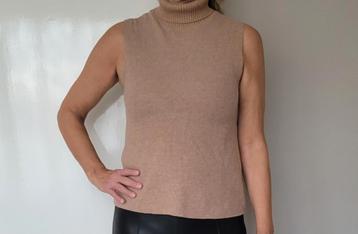 Super zachte mouwloze top S met rolkraag
Beige beschikbaar voor biedingen