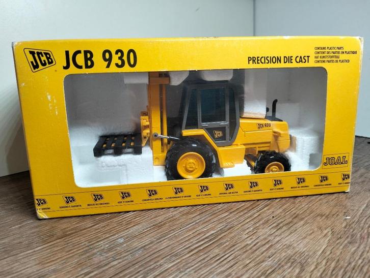 Te koop Joal JCB 930 Terrein heftruck., Hobby en Vrije tijd, Modelauto's | 1:32, Zo goed als nieuw, Tractor of Landbouw, Overige merken
