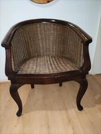 Oude stoel met rotan, Ophalen