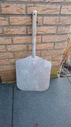 PIzza schep, Ophalen