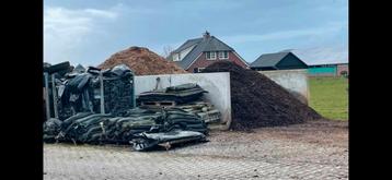 Houtsnippers en compost beschikbaar voor biedingen