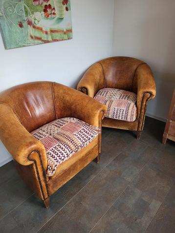 Twee lederen fauteuils in prima staat beschikbaar voor biedingen