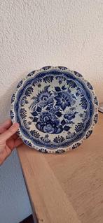 Delfts blauw bord, Ophalen