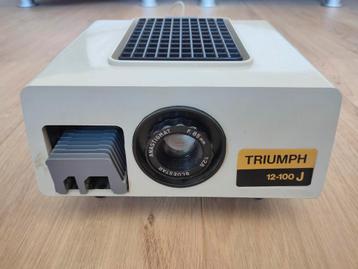 Triumph diaprojector 12-100J beschikbaar voor biedingen