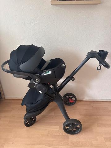 Stokke kinderwagen met Cybex autostoel beschikbaar voor biedingen