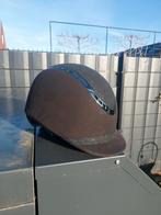 Paardrijcap, Ophalen