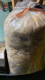 Schapenwol in zak, Ophalen, Spinwol
