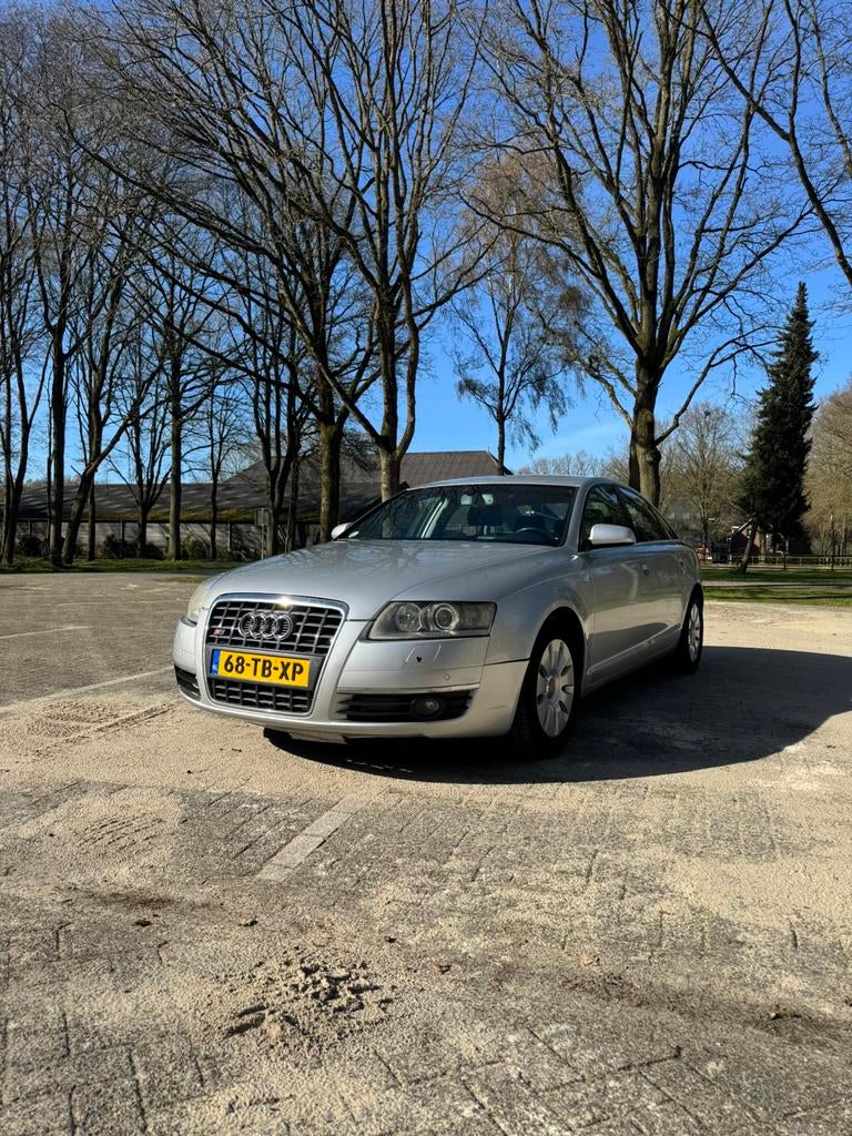 Audi A6 3.0 TDI Quattro Luchtvering | Keyless Entry | Leder, Auto's, Audi, Automaat, 232 pk, Zwart, Navigatiesysteem