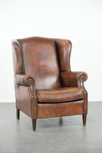Karaktervolle grote vintage oorfauteuil van schapenleer, Huis en Inrichting, Fauteuils, Ophalen, Gebruikt, ., .