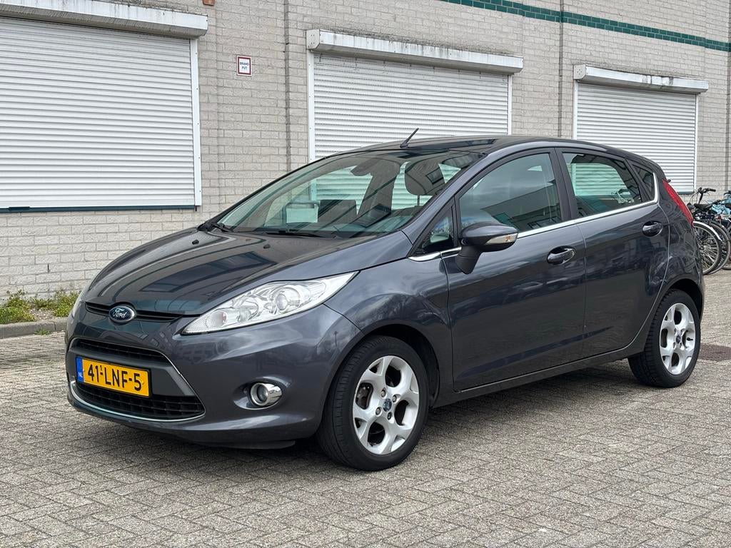 Ford Fiësta 1.25 60KW 5DR 2010 Grijs Carplay Airco, Voorwielaandrijving, Euro 5, Stof, Origineel Nederlands