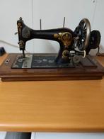 Oude naaimachine, Ophalen